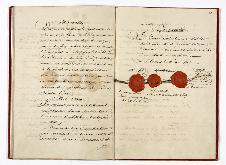 Constitution of the Free City of Krakow and its Territory. On chart no. 21 there are visible signatures of the representatives of the three patron states and heir seals, 1833 (ANK, Archiwum Wolnego Miasta Krakowa, sygn. WMK I 19, s. 20- 21)