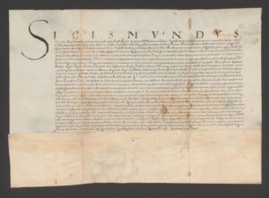 Zygmunt król polski stwierdza, że&nbsp;Achacy Jordan, kasztelan biecki, darował królowej Bonie plac, dom i&nbsp;łąki zwane „lanuschewski Kathnij”, położone „in Pobrzczieszen alias in sthare Bliechi” poza murami Kazimierza. Kraków, 24 marca 1547 roku. Pergamin; j. łaciński; wymiary 57,4 × 40,4 + 12,5 cm. ANK, Zbiór dokumentów pergaminowych, sygn. 29/657/564 