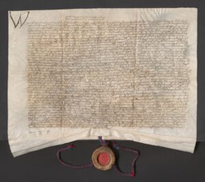 Bona królowa polska opisuje i&nbsp;potwierdza ugodę między kniaziem Fedorem Andrzejowiczem Sanguszką, starostą włodzimierskim, a&nbsp;jego bratem kniaziem Wasylem Michajłowiczem Sanguszką Kowelskim w&nbsp;sprawie granic między ich dobrami i&nbsp;rozmaitych wzajemnych pretensji, zawartą za&nbsp;sprawą jej komisarzy. Wilno, 5 sierpnia 1533 roku.Pergamin; j. ruski; wymiary 64,5 × 44,5 + 4,0 × 3,5 cm; pieczęć królowej. ANK, Archiwum Sanguszków, sygn. 29/637/183 